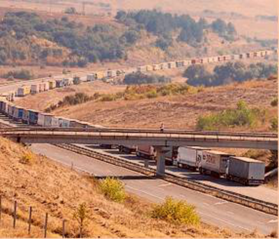 An image from the front page of the FT paper showing a queue of lorries at a Turkish border.